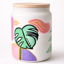 Hand painted candle jar with colorful abstract designs on a white background